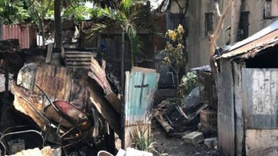Photo of Jamaican man saves baby from fire, but loses his home in the process