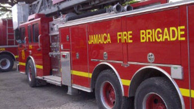 Photo of Jamaican woman charged after setting boyfriend’s house on fire