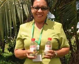 Photo of ‘Pomeroon Rose’ and her Virgin Coconut Oil: We’re in it for the long haul