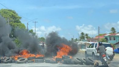 Photo of Police clear West Coast Berbice road after residents burn tyres, block passage