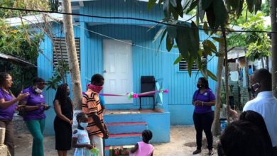Photo of Struggling Jamaican father overjoyed with gift of house