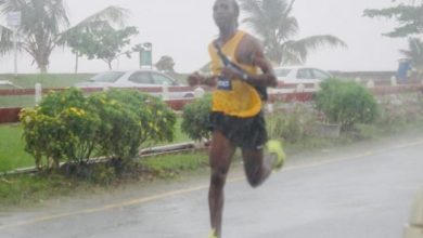 Photo of Guyana’s athletes compete in marathon distance relay event