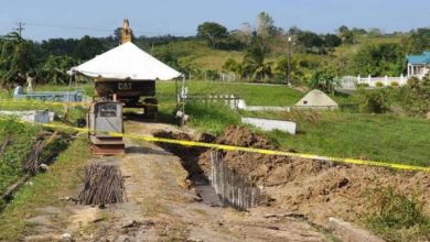 Photo of Trinidad contractor accused of digging up graves