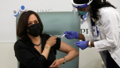 Photo of Guyanese-born nurse administers Moderna Covid-19 vaccine to VP-elect Kamala Harris