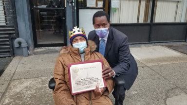 Photo of Eugene honors Jamaican constituent on 99th birthday