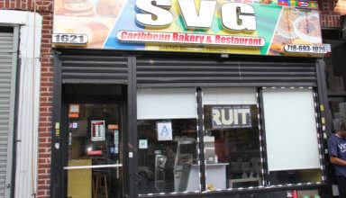 Photo of Owner of SVG Caribbean Bakery still rests on faith
