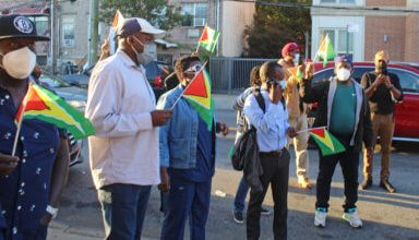 Photo of Guyana’s PM ignores protesters, encourages expats to invest in homeland