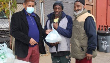 Photo of Brooklyn Mechanics serve warm Thanksgiving meals to community