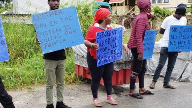 Photo of Family protests outside of DPP’s office for more charges over Quindon Bacchus killing