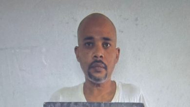 Photo of Two Guyana News Network reporters under arrest for extortion