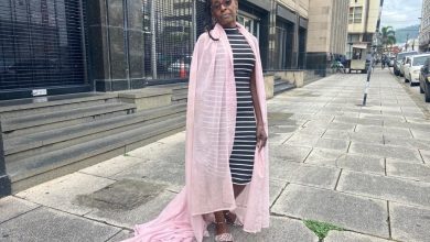 Photo of Trinidad woman wears curtain to enter gov’t office  