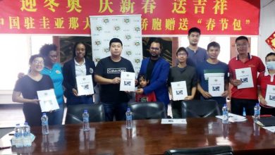 Photo of Consumer Affairs Act translated into Mandarin – …copies presented to Chinese Association of Guyana