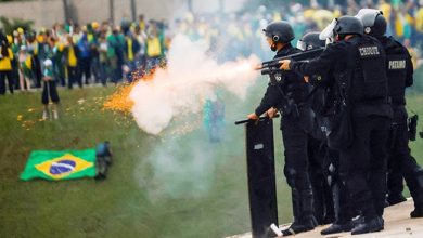 Photo of Brazil riot police deploy at Bolsonaro backers’ camp after capital stormed