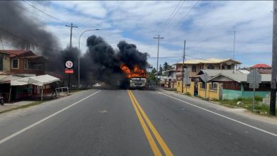 Photo of CANU chase into Buxton triggers unrest – -road blocked, truck set afire after Vigilance man arrested over large stash of ganja