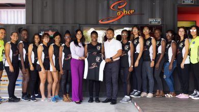 Photo of U21 hockey team receives uniforms from Sabor Restaurant and Catering Service