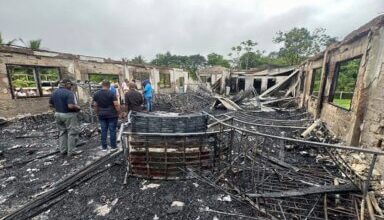 Photo of Guyana girls dorm fire that killed 19 was deliberately set by student, official says