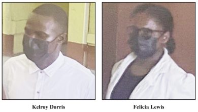 Photo of Two police officers charged with larceny and fraud