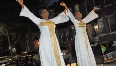 Photo of Guyanese in Brooklyn hold all-white candlelight vigil for victims of massive fire