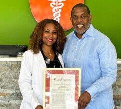 Photo of  Sen Kevin Parker honors Dr. Tamara Moise for outstanding community service