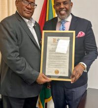 Photo of Sen. Parker honors Amb. Michael E. Brotherson for outstanding community service