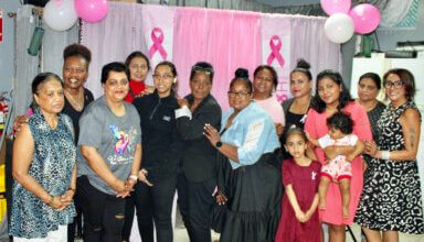 Photo of Queens Cancer Walk group honors victims during candlelight vigil at Radha Krishna Mandir in Queens