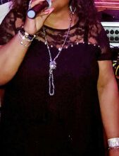 Photo of Trinidadian musical artist ‘Lady Charms’ at Caribbean heritage, American spirit crossroads
