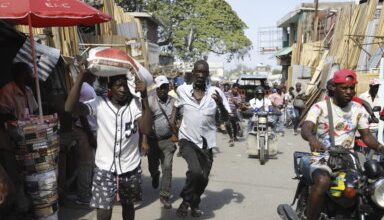 Photo of Foreigners trapped in violence-torn Haiti wait desperately for a way out