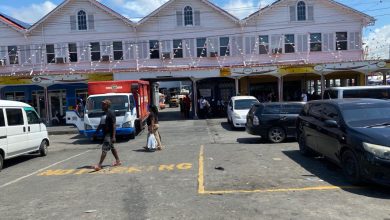 Photo of Vendors displaced from outside Discount Store saddened