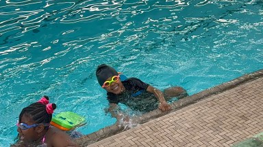 Photo of Swim 1922 event brings joy to youngsters at Bed-Stuy YMCA pool