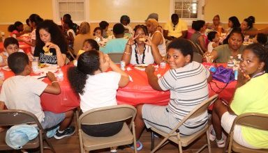 Photo of Brooklyn church provides sumptuous lunch, entertainment to homeless families