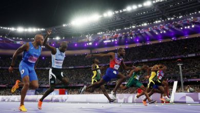 Photo of Showman Lyles wins 100m gold  by five thousandths of a second