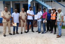 Photo of Contract for rebuilding of Anna Regina Police Station handed over