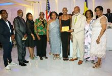 Photo of Vincentians present over $7K to Olympian Shafiqua Maloney