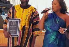 Photo of Vincy Penn Relays pioneer, coordinator James Cordice honored