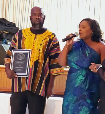 Photo of Vincy Penn Relays pioneer, coordinator James Cordice honored