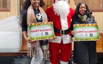 Photo of Caribbean-American District Leader Anthony Beckford plays Brooklyn’s Black Santa joyfully