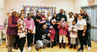 Photo of Guyana Alumni Associations, Diaspora Inc. bring Christmas cheer to kids at Brooklyn toy giveaway