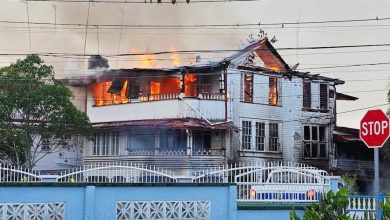 Photo of NA wooden building hit by two fires