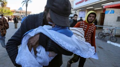 Photo of Displaced Gaza newborn freezes to death and twin fights for his life as rain floods tents