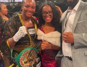 Photo of Jamaican-Canadian singing, acting prodigy Jazmin Headley sings USA National Anthem at women’s heavyweight boxing match