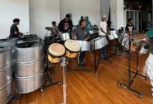 Photo of Trinidadian steelpan virtuoso coaches Tropicalfete’s Steel Ensemble