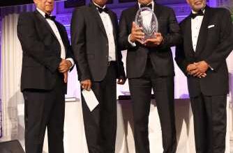 Photo of Holness awarded AFUWI’s prestigious Legacy prize